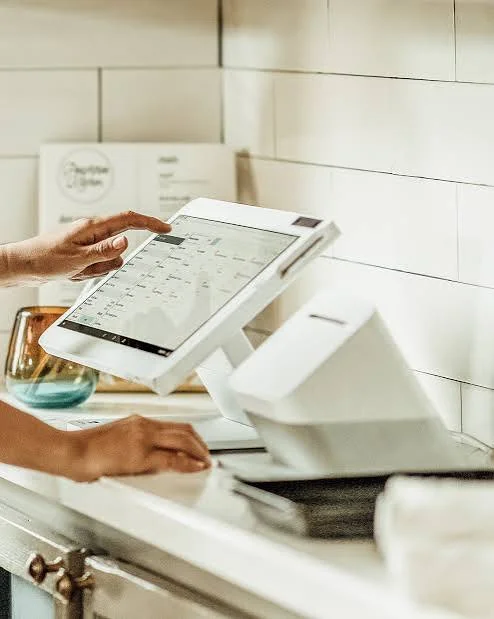 Clover Station Solo POS on a cafe counter