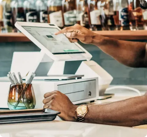 Point-of-sale system in use behind a service counter